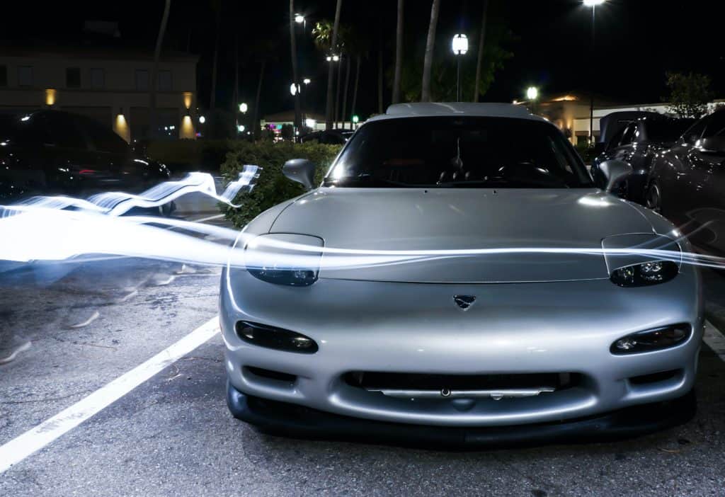 Silver car at night